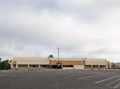 strip shopping center car