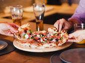 busy pizzeria with liquor