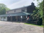 income-producing five-unit mixed-use property