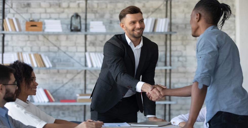 Two businessmen shaking hands