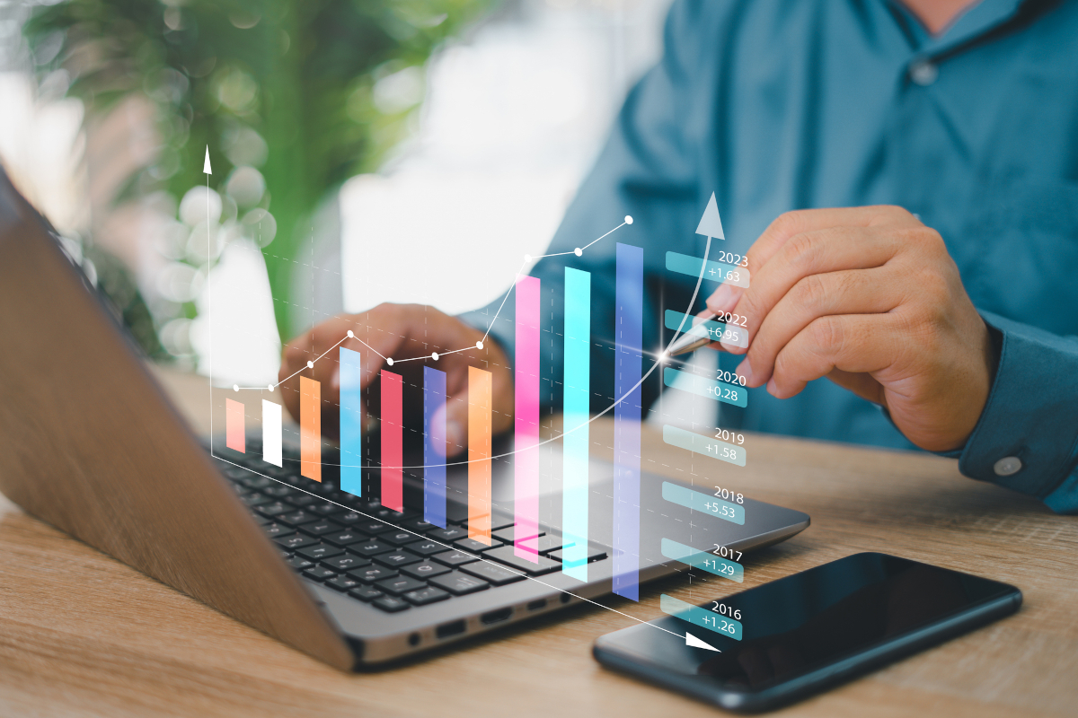 Business owner looking at financial details on laptop