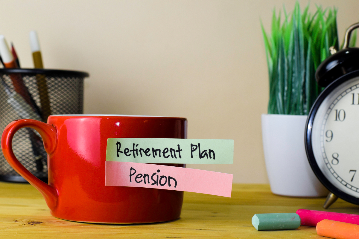Retirement plan and pension sticky notes on a mug
